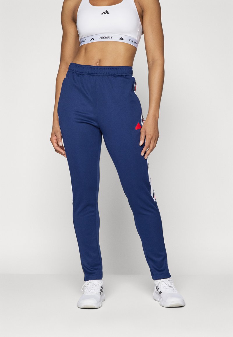 adidas Sportswear - TIRO CUT STRIPES TRACKPANTS - Treniņtērpa apakšdaļas - navy blue/white/better scarlet, Palielināt