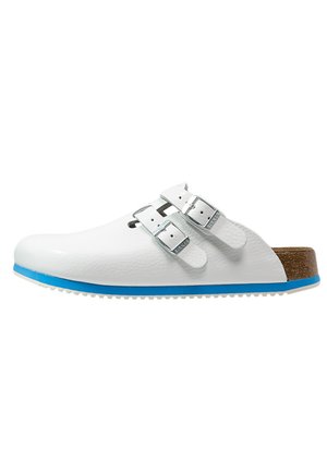 White clog with double silver buckles, blue sole accent, textured upper, and brown cork footbed. Smooth finish and rounded toe design.