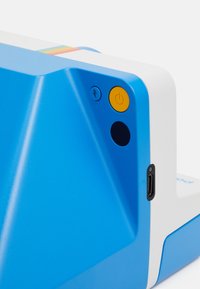 Compact blue device with a textured surface, featuring a white casing, yellow power button, blue indicator, and USB-C port.