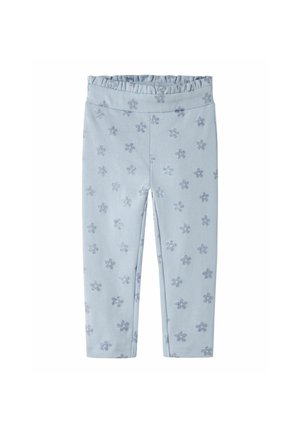 Legging pour enfants bleu clair avec une taille élastique et un motif de flocons de neige argentés à paillettes, répartis uniformément sur le tissu.