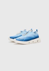 Light blue athletic sneakers with a gradient design, white sole, lace-up closure, and logo accents on the sides and back.
