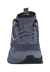 Grey athletic shoes featuring a mesh upper with orange accents, sturdy laces, and a black rubber sole, designed for performance and comfort.