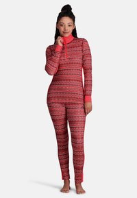 Rotes gemustertes Langarm-Bodysuit mit einem halben Reißverschlusskragen, der geometrische Designs in Weiß und Schwarz aufweist. Weicher, elastischer Stoff.