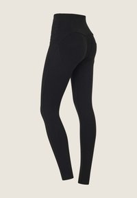 Schwarze, hochtaillierte Leggings mit glatter Textur, ausgestattet mit Seitennähten und einem Kreuzdesign am Taillenbund. Geeignet für Sportbekleidung.