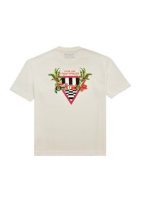 Cremefarvet bomulds t-shirt med et farverigt grafisk design, der inkluderer tropiske blade, et ternet mønster og teksten "PAS DE MONACO."