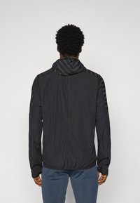 Dynafit TRAIL REFLECTIVE WIND - Veste coupe-vent - black out