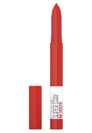 Red lip crayon with a pointed tip and matte finish. Features a twist-up design and white label with black text for easy identification.