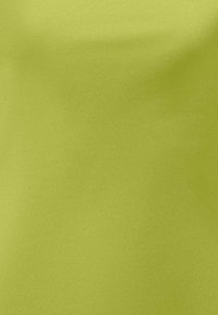 Fond texturé vert olive uni avec des zones légèrement plus foncées, montrant une répartition légèrement inégale des couleurs.