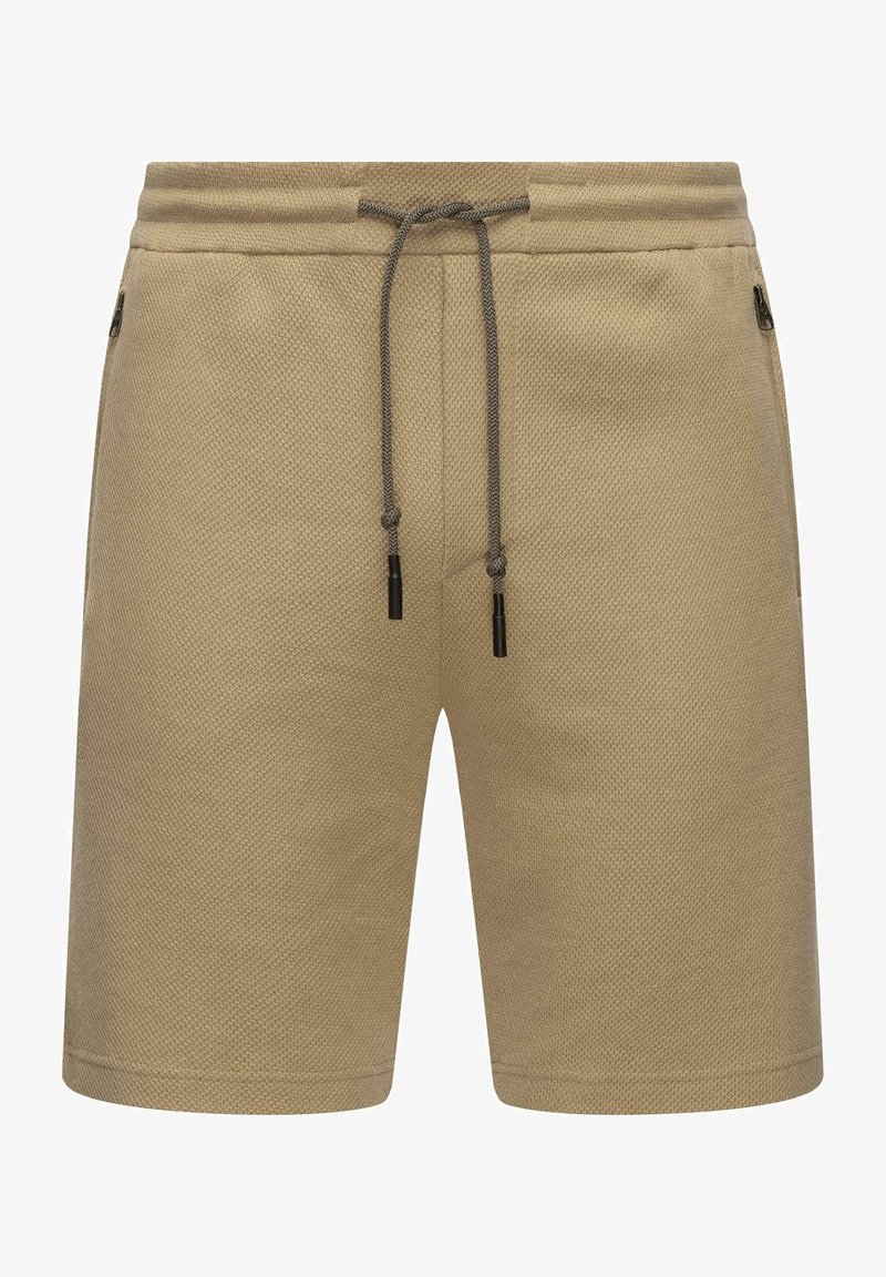Tan woven shorts with a textured pattern, elastic waistband, adjustable drawstring, and side zip pockets.