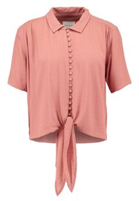 Blouse rose à manches courtes avec un col, présentant une rangée de boutons décoratifs sur le devant et un détail de nœud noué à l'ourlet.