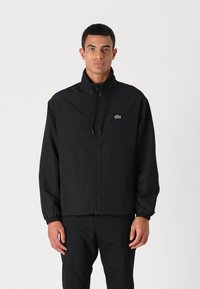 Lacoste - Jachetă subțire - noir Imagine miniatură 1