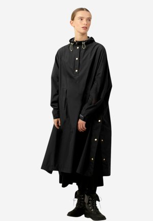 Black waterproof coat with a hood, front buttons, side snaps, and a loose-fit design. Made from lightweight fabric, offering coverage to the knees.