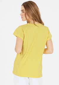 Cruz T-paita - goldfinch