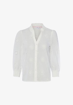 Blouse blanche à manches longues avec motifs floraux ajourés, col à volants, fermeture boutonnée devant et poignets froncés.