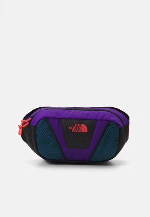 Purple and black North Face waist bag with mesh side panels, orange zipper pulls, and red logo on front center.