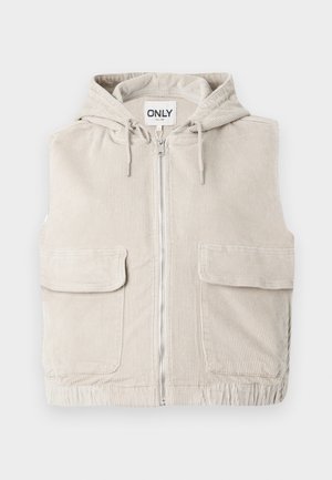 Bézs kordbársony mellény kapucnival, elülső cipzáras záródással és két nagy első zsebbel. Texturált felület és varrott szegély jellemzi.