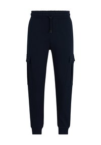 Mörkblå cargobyxor i sweatpants-modell med elastisk midja, snöre och två sidofickor. Tillverkade av mjukt tyg med ribbade ankle cuffs.