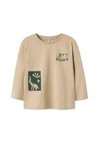 Beige Langarm-T-Shirt aus weicher Baumwolle mit dem Text "LET'S ROAR" und einem grünen Dinosaurier-Graphic auf der Vorderseite, mit einem strukturierten Design.