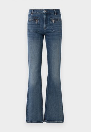 Flared blue denim jeans with a mid-rise waist, featuring front and back pockets and a subtle faded wash.