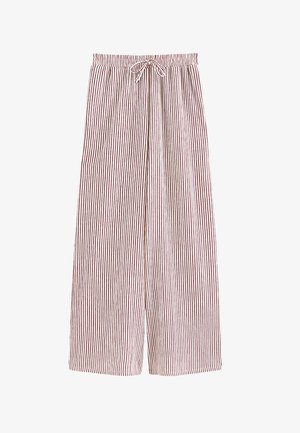 Loszittende broek met rode en witte verticale strepen en een elastische tailleband met aantrekkoord.