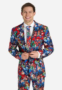 Colorful suit featuring a vibrant comic book print with various superheroes. Includes a matching tie and white dress shirt. Smooth fabric texture.