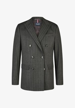 Veste grise croisée à rayures verticales, dotée de revers en pointe, de deux poches avant et de six boutons noirs. La texture semble lisse.