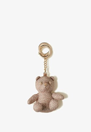 Schlüsselanhänger mit einem weichen Teddybär aus beigem gemustertem Stoff und goldfarbenem Metallring und Kettenglied.