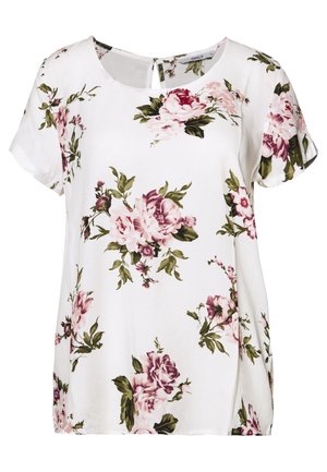Witte korte mouwen blouse met ronde halslijn met roze en paarse bloemenpatronen en groene bladeren verspreid over de stof.