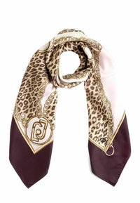 Foulard di seta con stampa leopardata, motivo a catena dorata e accenti bordeaux. Texture morbida, forma allungata con estremità appuntite.