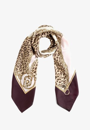 Foulard di seta con stampa leopardata, motivo a catena dorata e accenti bordeaux. Texture morbida, forma allungata con estremità appuntite.