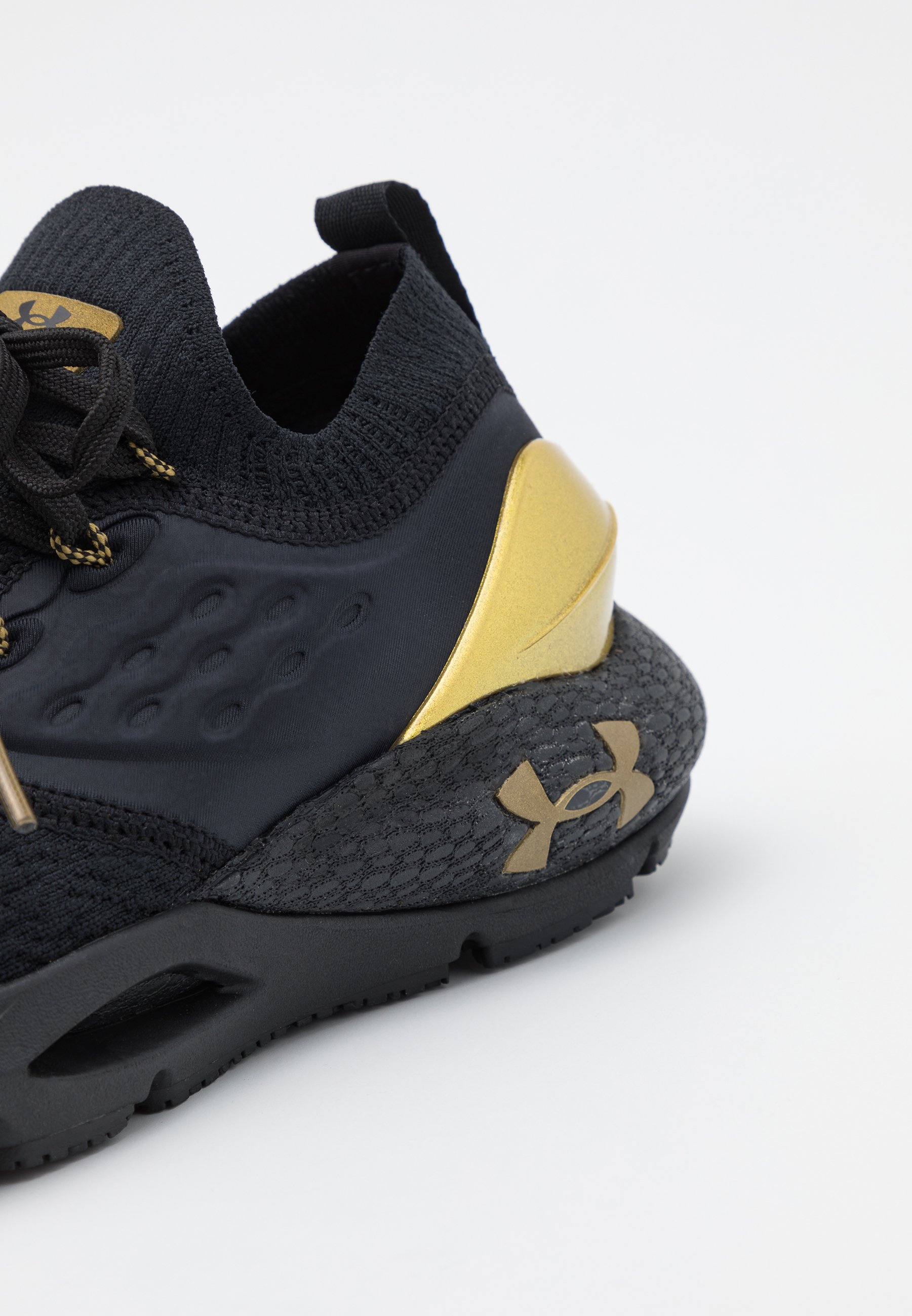 under armour gold and black shoes