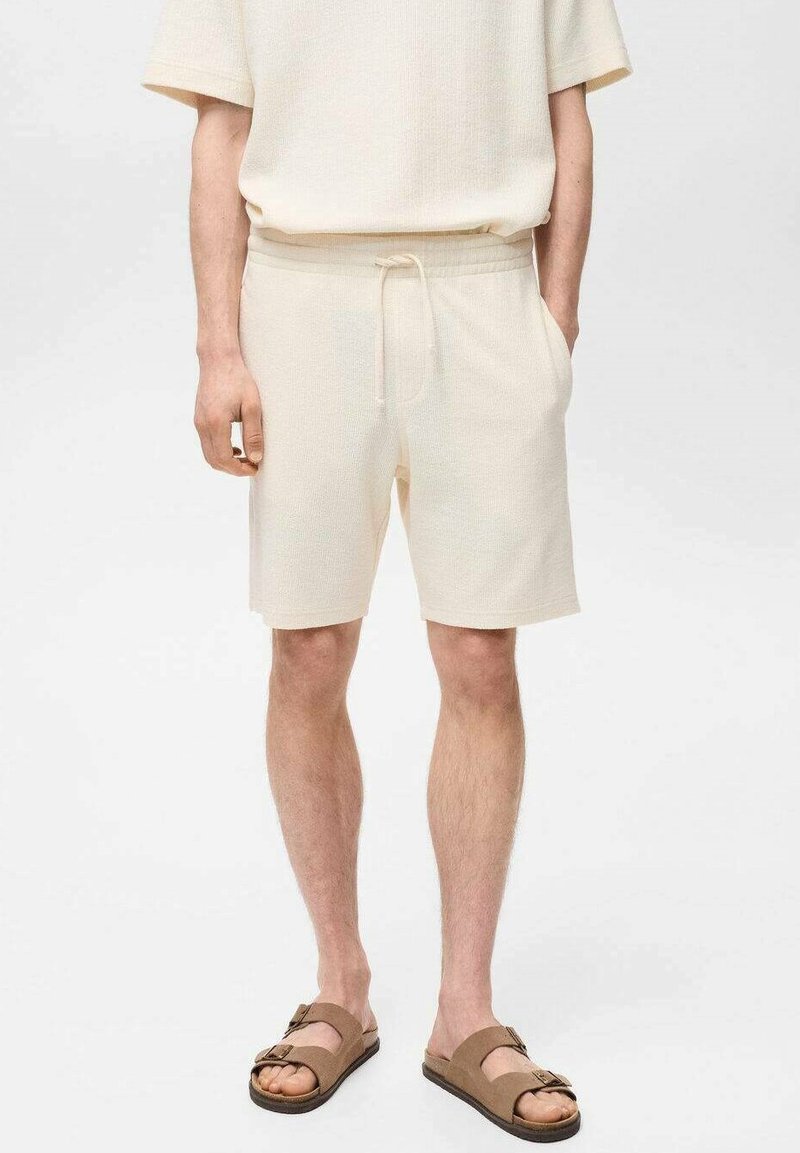 Mango XAVIS - Teplákové kalhoty - off-white