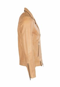 Pruun nahktagi, millel on kehale sobiv lõige, asümmeetriline tõmblukuga sulgus, kaks küljetaskut tõmblukkudega ning mansettidel reguleeritava sobivuse jaoks tõmblukud.