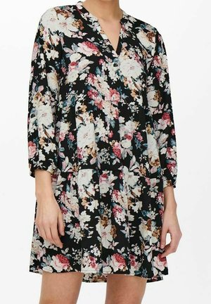 Black floral dress with a deep V-neck, long sleeves, and gathered waist. Features large white, pink, and blue flowers with green leaves.
