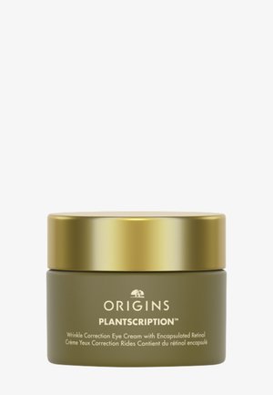 Bocal en verre vert avec un couvercle doré, étiqueté "ORIGINS PLANTSCRIPTION™". Contient une crème pour les yeux anti-rides avec une surface lisse.