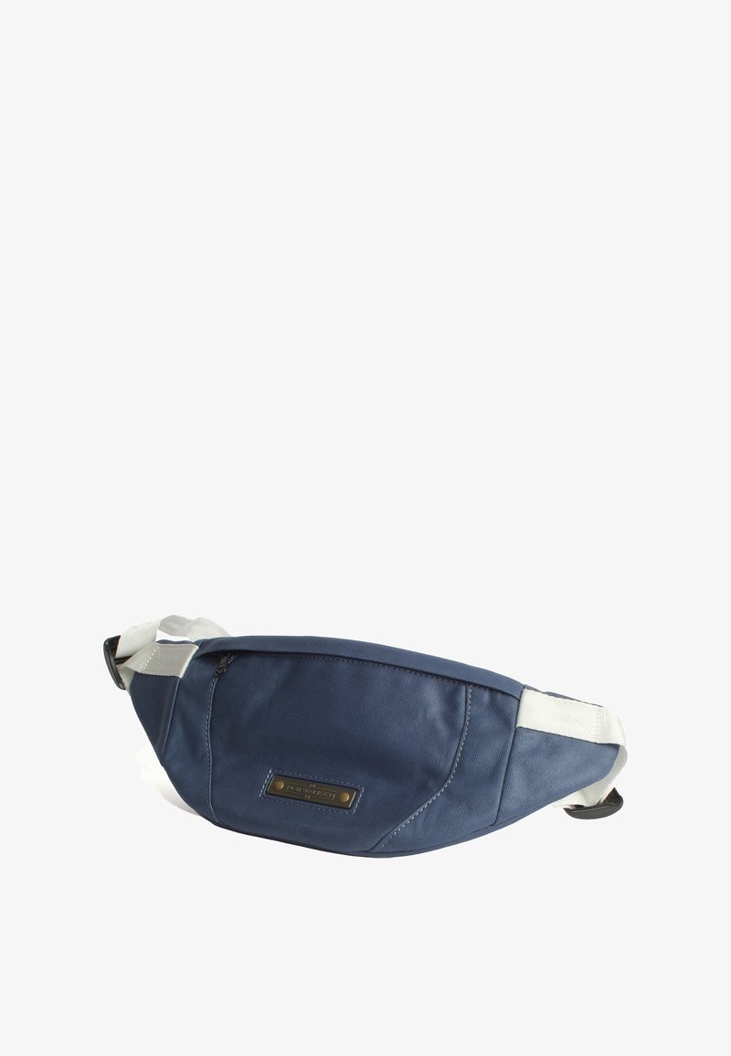 Navy-blue fanny pack with a textured fabric, adjustable white strap, zippered pocket, and a branded metal plate on the front.