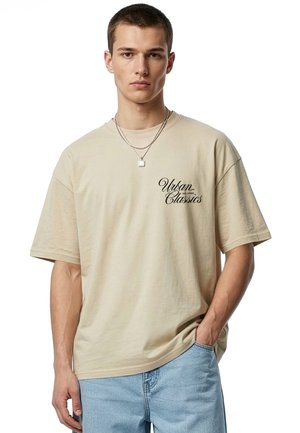 Urban Classics, URBAN CLASSICS FLOW SCRIPT LOGO LOOSE TEE - Tričko s potlačou - whitesand