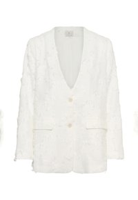 Blazer blanc texturé à manches longues, avec deux boutons sur le devant et des poches à rabat, présentant un motif floral subtil et une étiquette à l'intérieur du col.