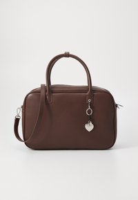 Brown handbag made of smooth synthetic material, featuring two handles, a removable shoulder strap, and a heart-shaped charm.