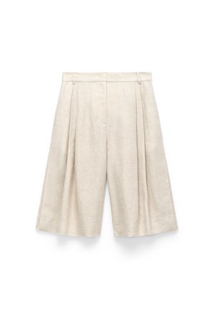 ADOLFO DOMINGUEZ, Short - stone