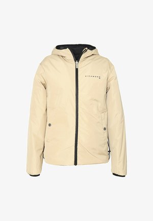 Giacca a vento beige con cappuccio, zip frontale e accenti neri. Presenta un logo sul petto e coulisse regolabili all'orlo.