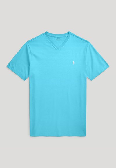 Tyrkysové tričko s výstřihem do V vyrobené z měkké bavlny. Krátké rukávy a malé bílé logo na levé části hrudi. Jednoduchý, jednobarevný design.