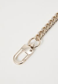 Silver chain link accessory with a sturdy clasp. Features smooth, polished metal finish and interlocking links.