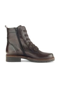 Bota de cuero marrón hasta el tobillo con cremallera lateral, parte frontal con cordones, superficie texturizada y tacón bajo en bloque. Suela de goma con ranuras de tracción.