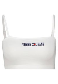 Biały top na ramiączkach spaghetti, z niebieskim i czerwonym haftowanym napisem "TOMMY JEANS" na środku. Wykonany z gładkiego, elastycznego materiału.