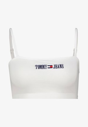 Biały top na ramiączkach spaghetti, z niebieskim i czerwonym haftowanym napisem "TOMMY JEANS" na środku. Wykonany z gładkiego, elastycznego materiału.