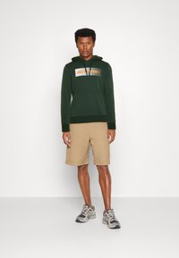 JACK & JONES JUNIOR hoodie JJECORP met logo donkergroen