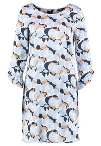 Šaty s krátkým rukávem v světle modré látce, s kruhovým vzorem v námořnické modré, oranžové a bílé barvě. Pohodlný střih s nařasenými detaily na rukávech.