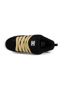 Black sneaker with yellow and pink woven laces, white sole, and DC logo visible on tongue and inside heel area.