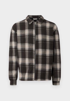 Black and white checkered flannel jacket with a zip closure, collared design, long sleeves, and soft texture.
